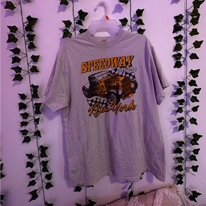 Off white t shirt with yellow writing, One size.